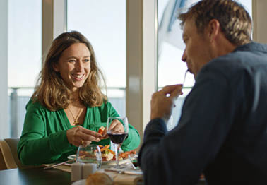 Couple in restaurant on board Pont Aven. Photoshoot for TOY Campaign 2022. Do not use after 22-12-2025.
