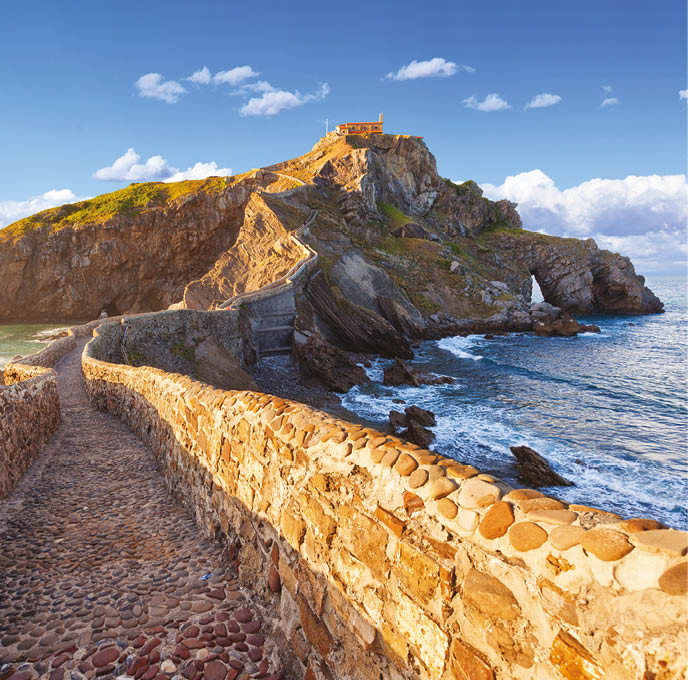 Gaztelugatxe is an islet on the coast of Biscay near Bermeo, in Basque Country, Spain. It is connected to the mainland by a man-made bridge